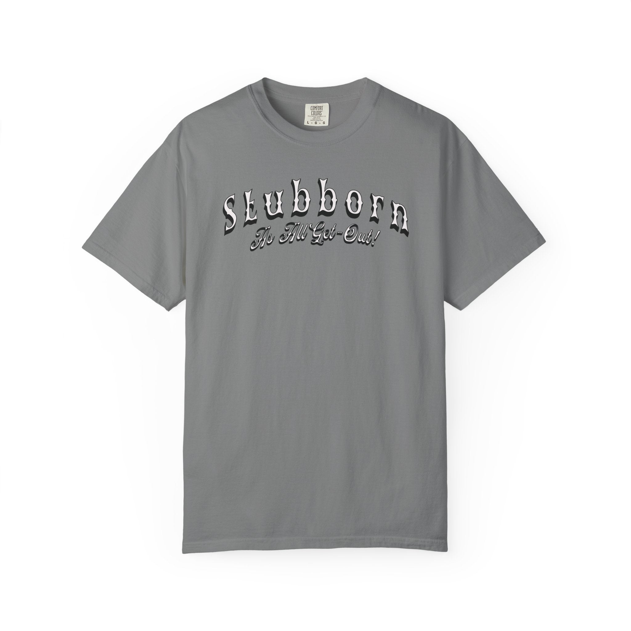 Gray t-shirt with 'Stubborn Be Told Yet Again' text on a white background