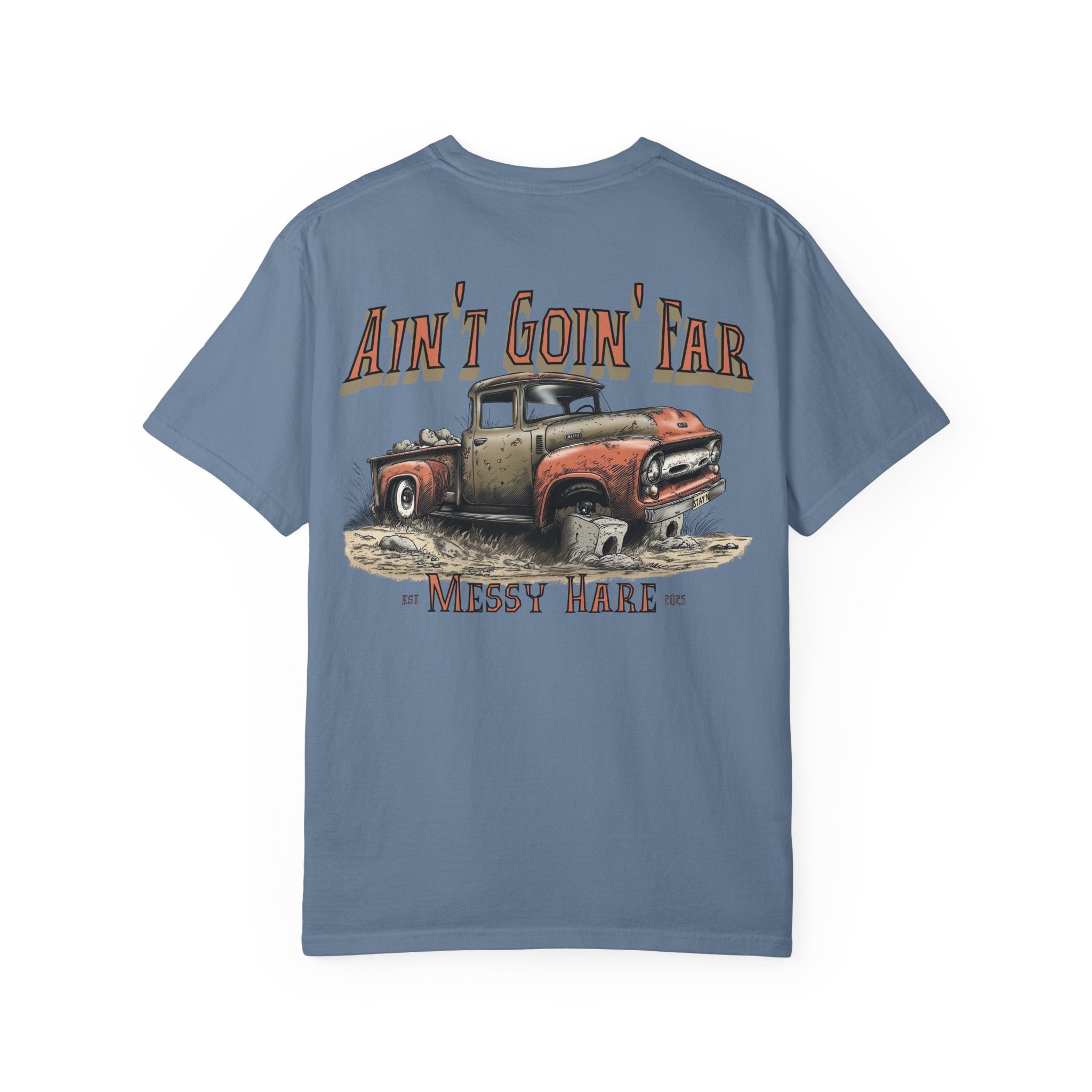 Blue t-shirt with a graphic of an old truck and text on a white background