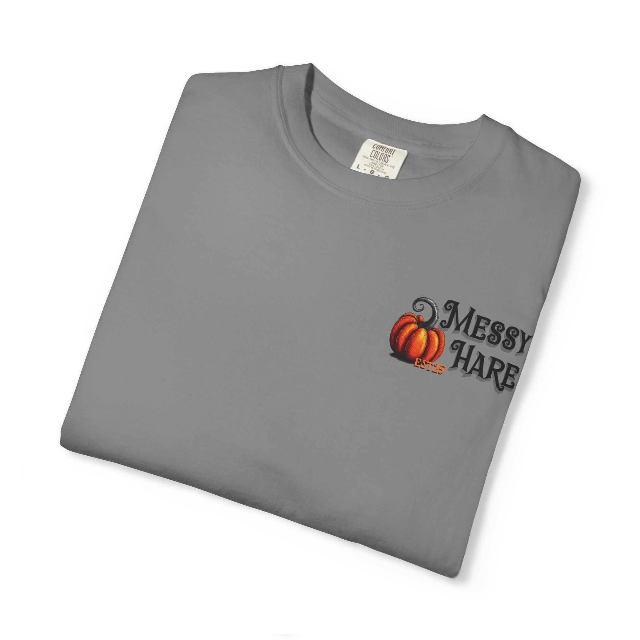 Folded gray t-shirt with a pumpkin and text design on a white background