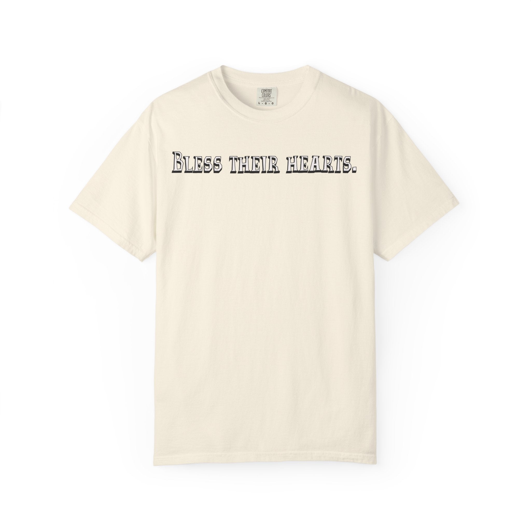 Beige t-shirt with 'Bless Their Hearts' text on a white background