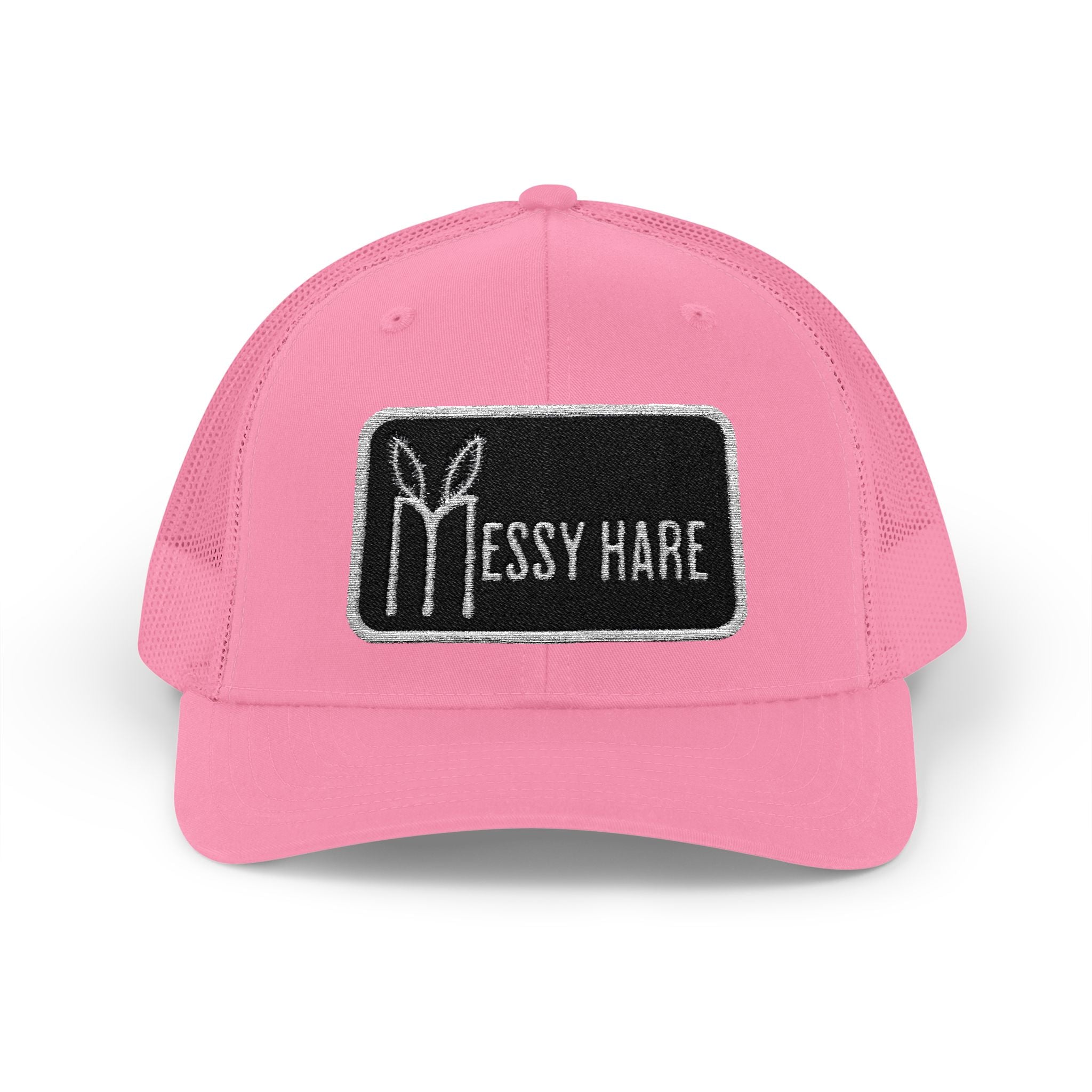 Pink cap with a black patch featuring 'Messy Hare' logo on a white background