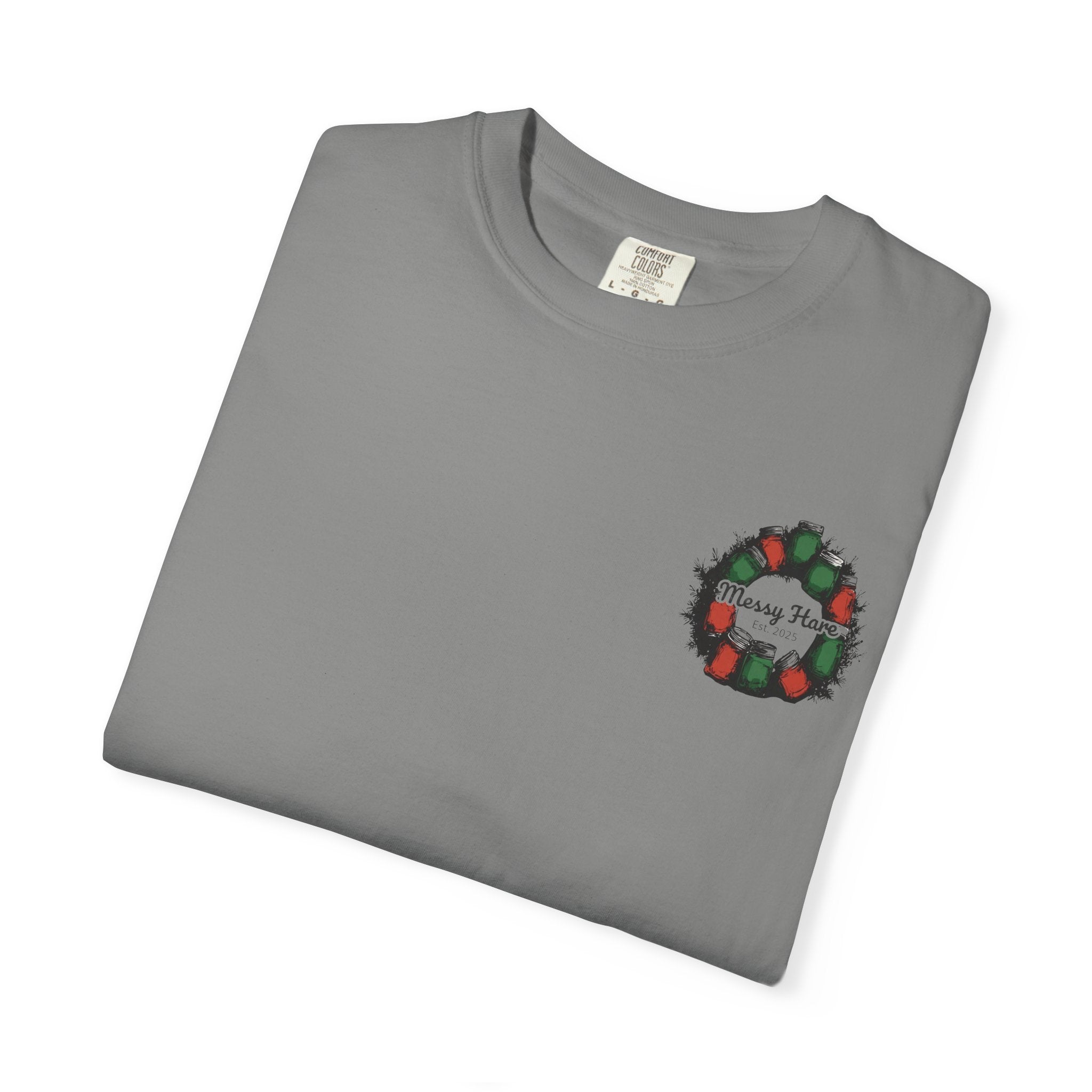 Folded gray t-shirt with a Christmas wreath design on a white background