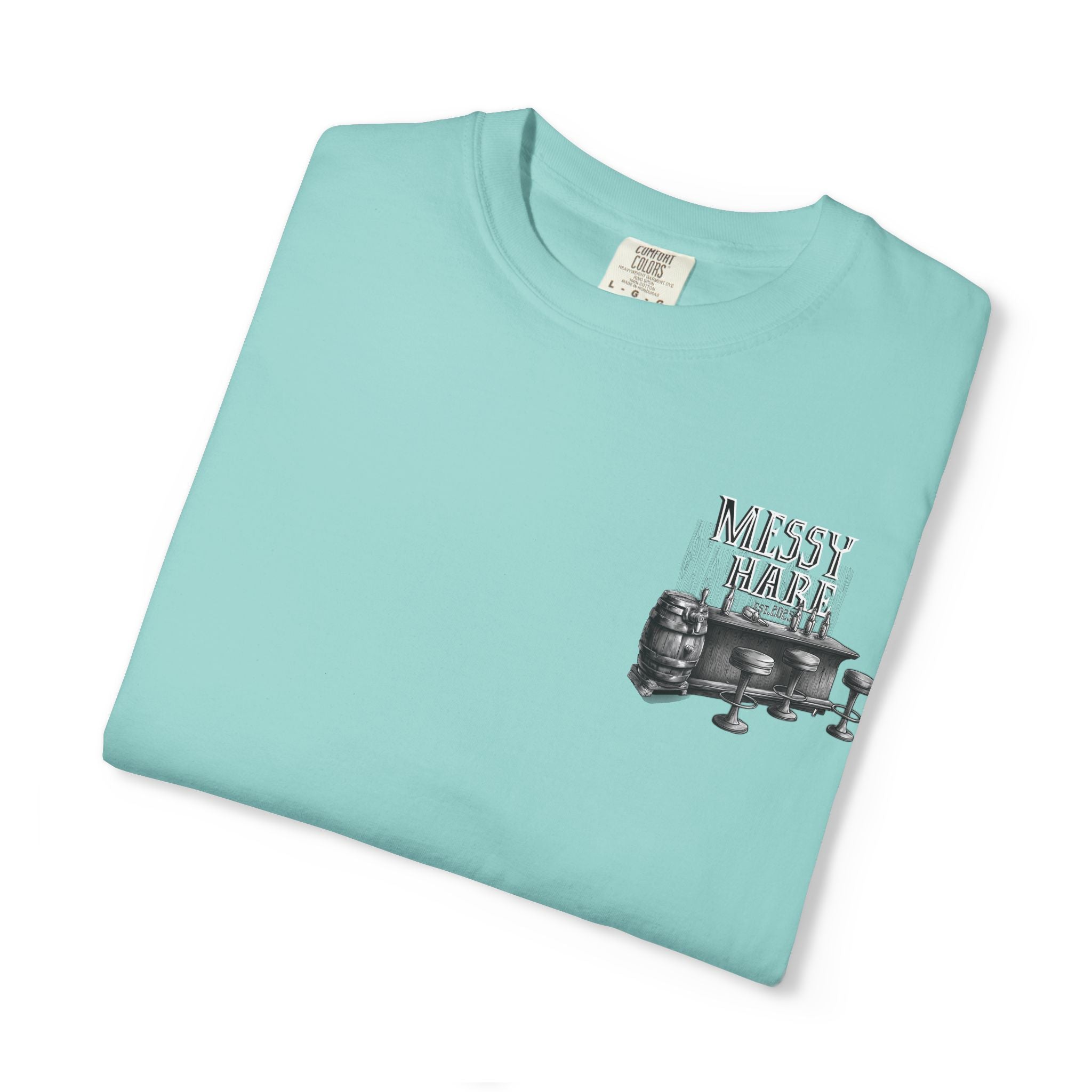 Folded light blue t-shirt with graphic design and text on a white background