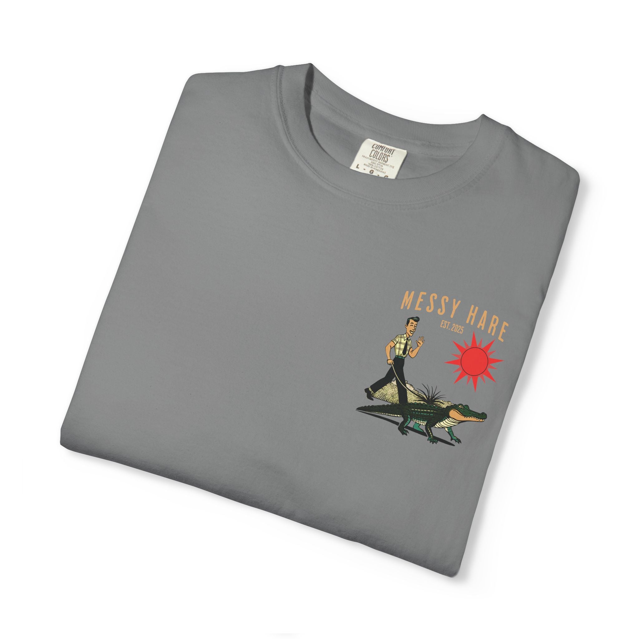 Folded gray t-shirt with 'Messy Hare' graphic design on a white background