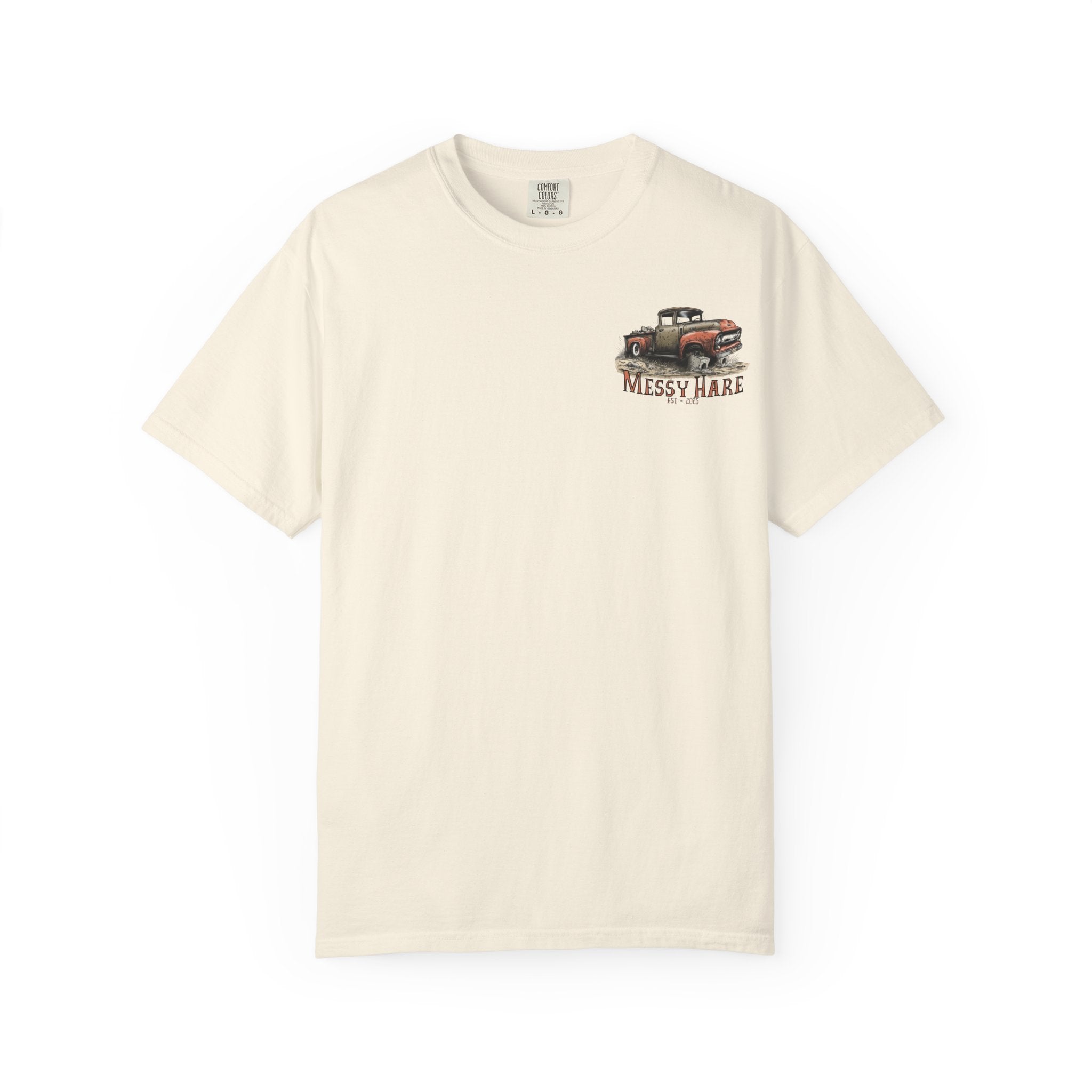Beige t-shirt with a graphic of a truck and 'Messy Hare' text on a white background