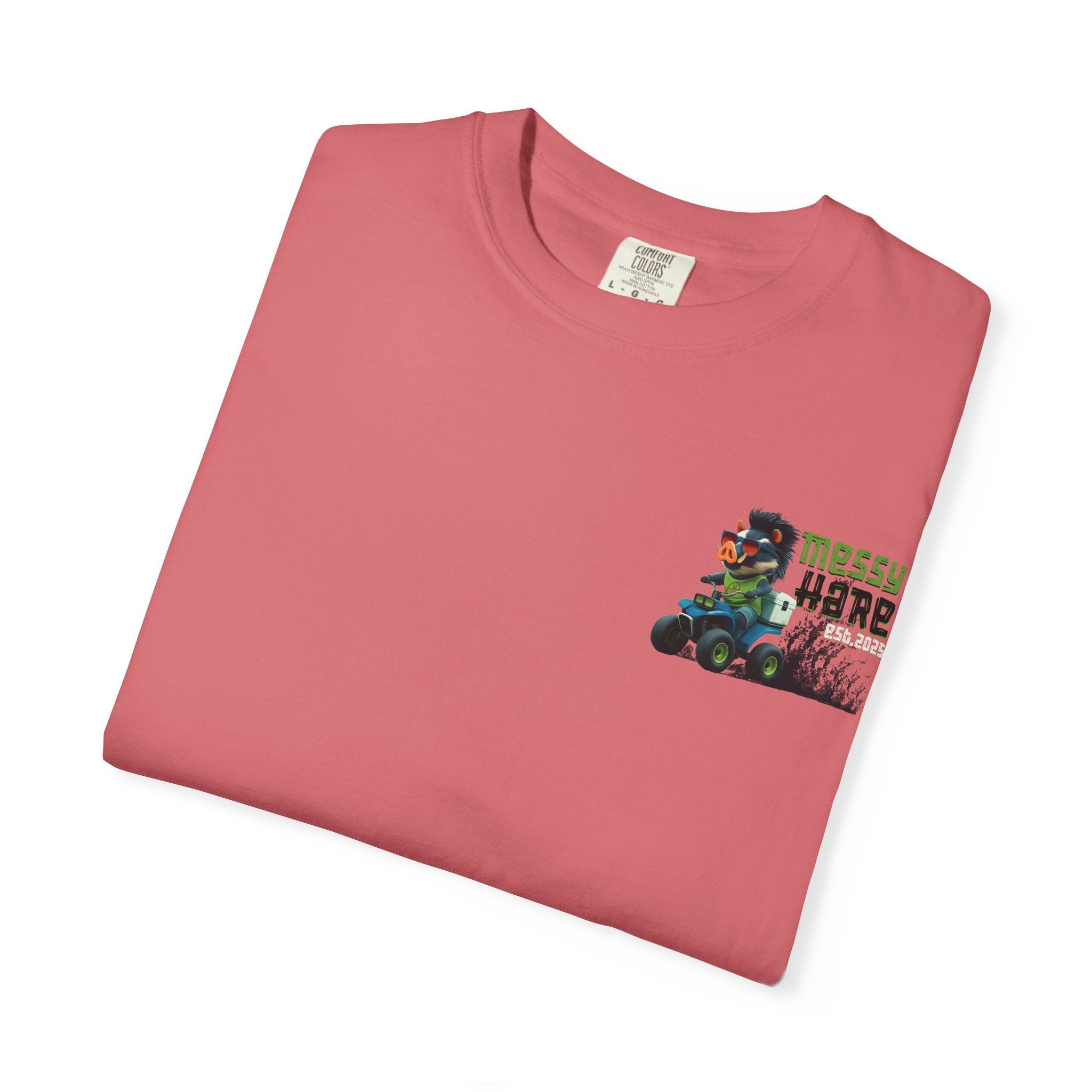 Folded pink t-shirt with a graphic design on a white background