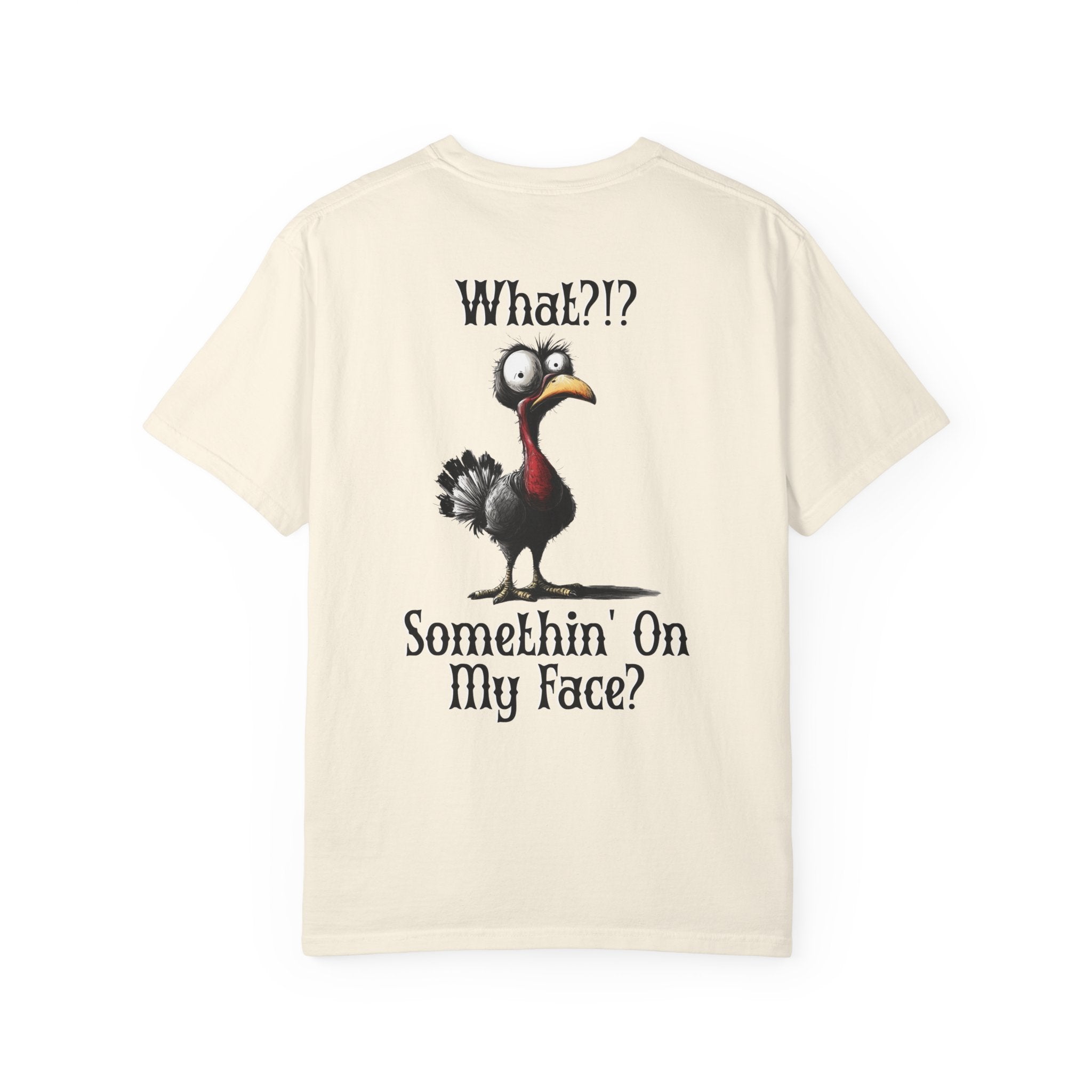 Beige t-shirt with cartoon chicken graphic and text on a white background
