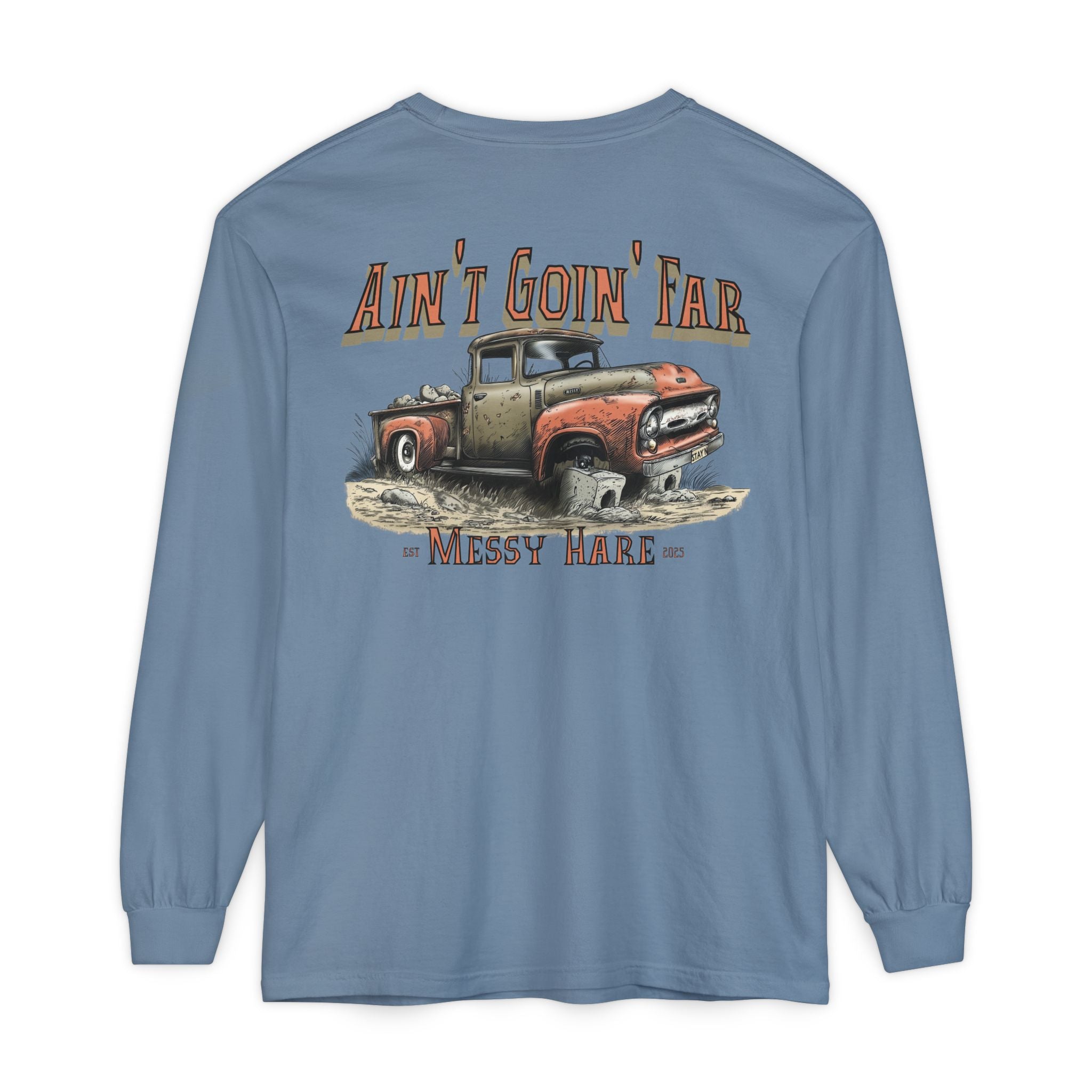 Blue long-sleeve shirt with a graphic of an old truck and text 'Ain't Goin' Far' by Messy Hare on a white background.