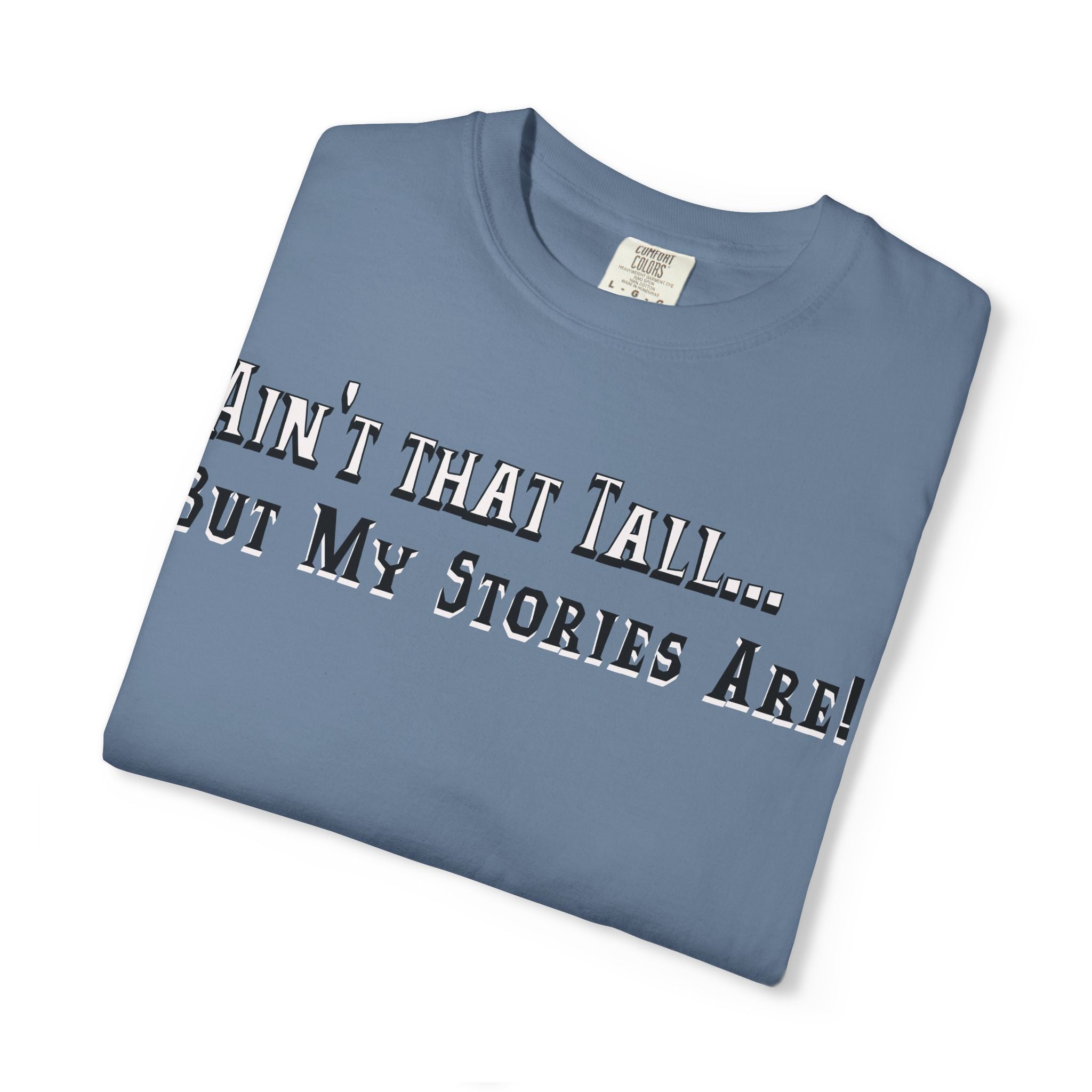 Folded blue t-shirt with text on a white background