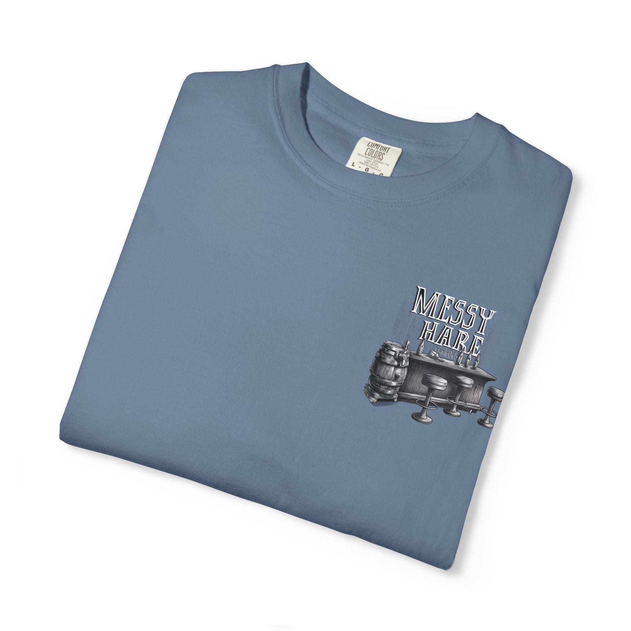 Folded blue t-shirt with 'Messy Mare' graphic on a white background