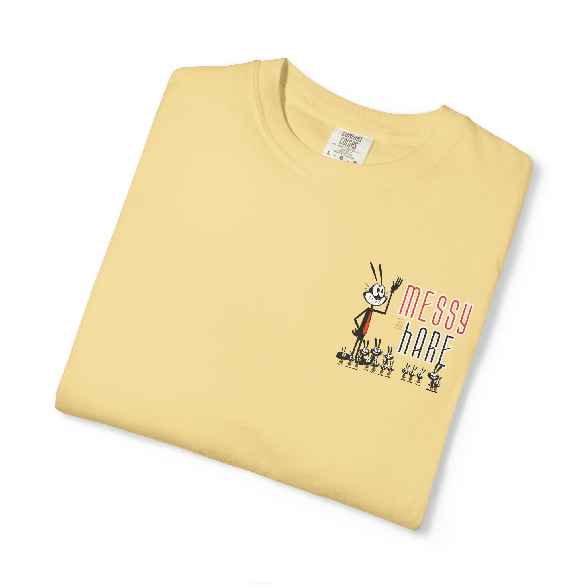 Folded yellow t-shirt with cartoon character and 'Messy Hare' text on a white background