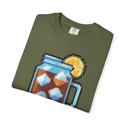 Folded green t-shirt with pixel art design on a white background