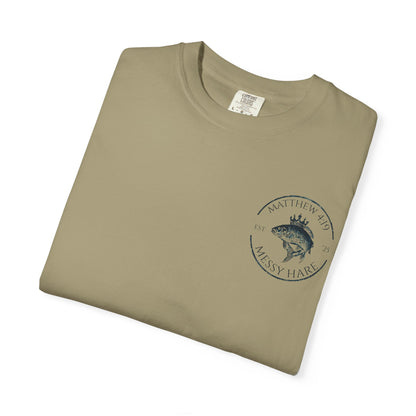 Folded khaki t-shirt with a logo on a white background