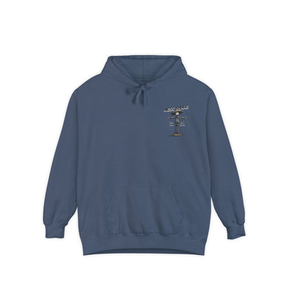 Blue hoodie with a graphic design on the chest against a white background