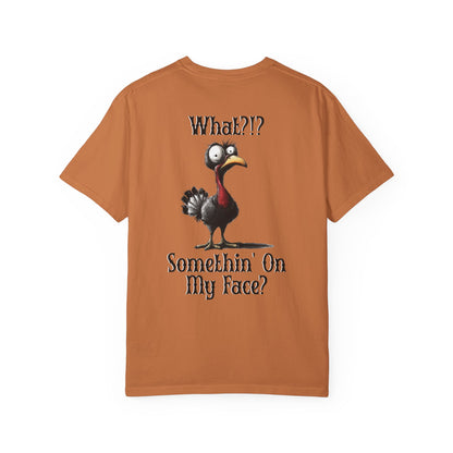 Brown t-shirt with a cartoon turkey and text on the back against a white background