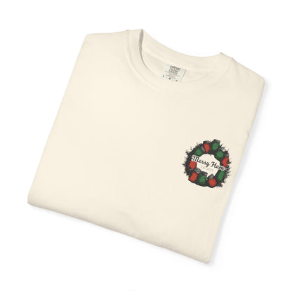 Folded cream-colored sweatshirt with a Christmas wreath design on a white background