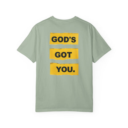 Light green t-shirt with 'GOD'S GOT YOU' text in yellow on a white background