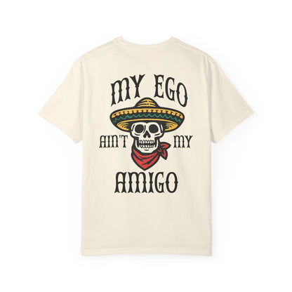 Beige t-shirt with skull graphic and text on a white background