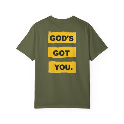 Green t-shirt with 'GOD'S GOT YOU' text on a white background