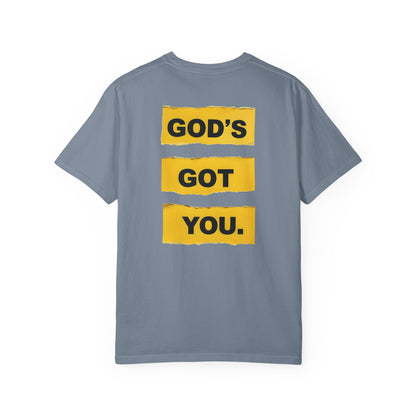 Blue jean colored t-shirt with 'GOD'S GOT YOU.' text in yellow on a white background