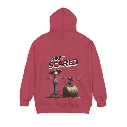 Red hoodie with 'Ain't Scared' graphic on the back