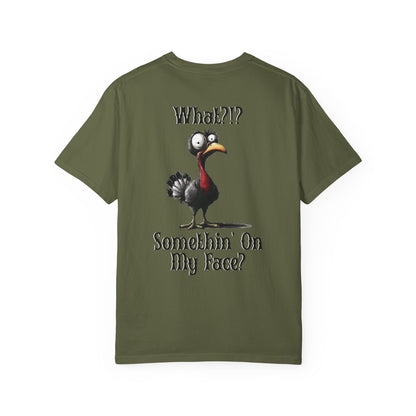 Green t-shirt with a cartoon turkey graphic and text on a white background