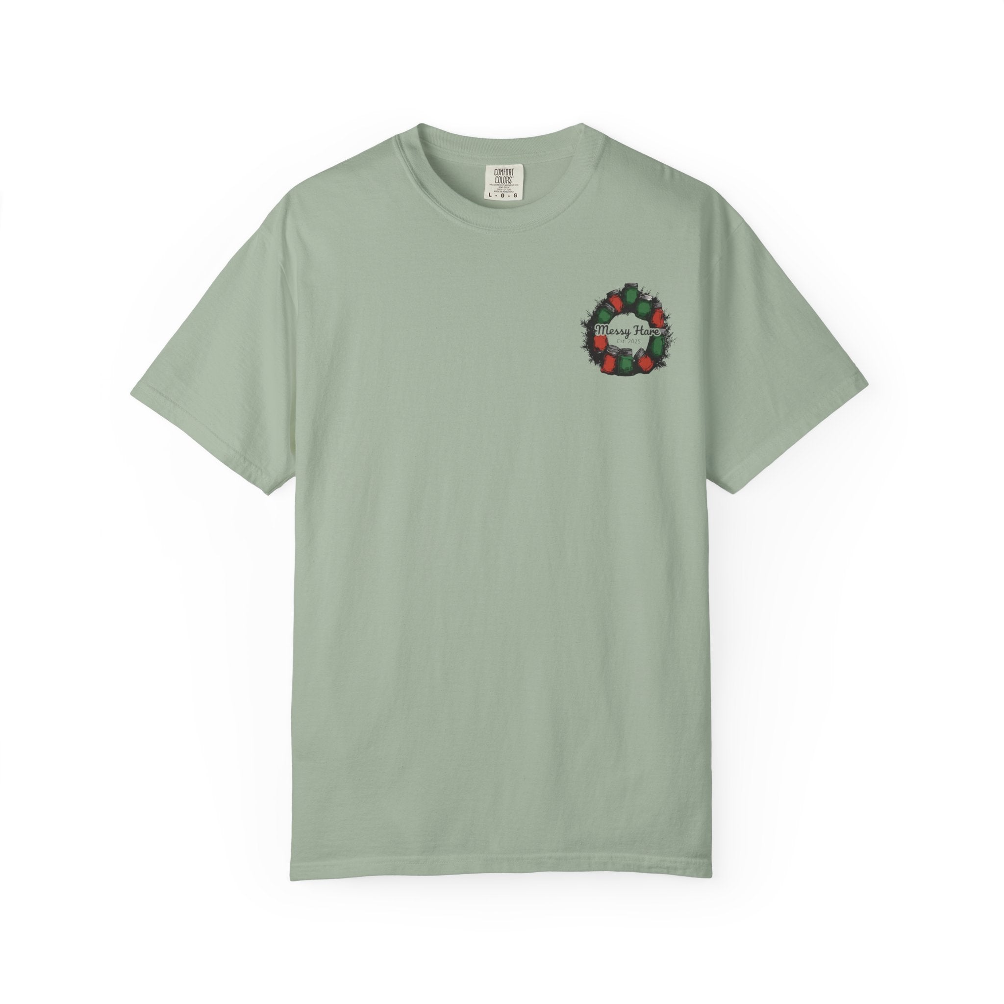 Light green t-shirt with a small graphic on a white background