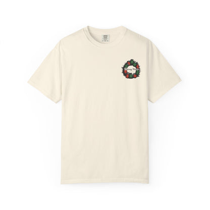 Beige t-shirt with a Christmas wreath design on a white background
