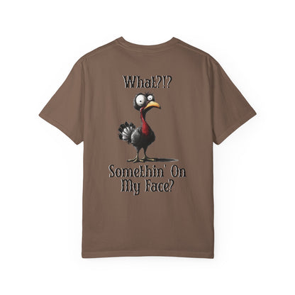 Brown t-shirt with a cartoon turkey graphic and text on a white background