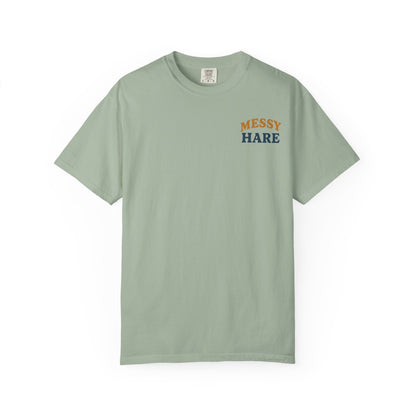 Green t-shirt with 'Messy Hare' text on a white background