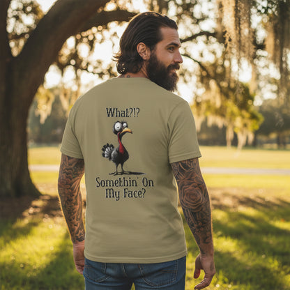 Man wearing a t-shirt with a graphic and text in a park